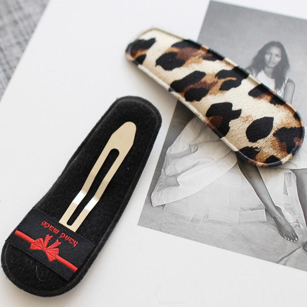 leopard printed hair clips closeup